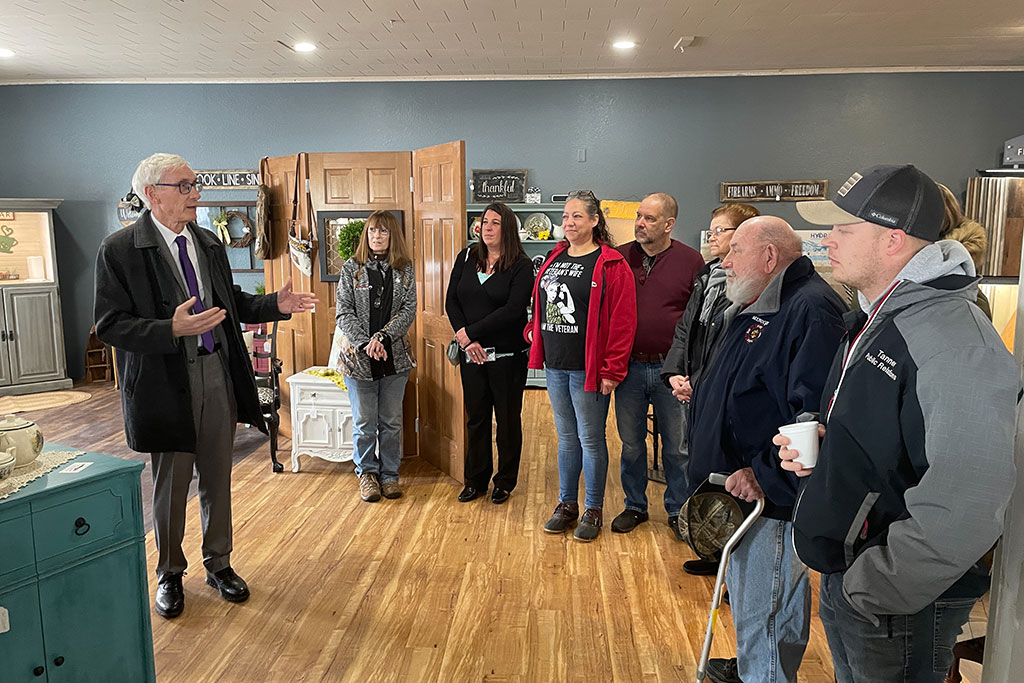 Governor Tony Evers talks with business owners