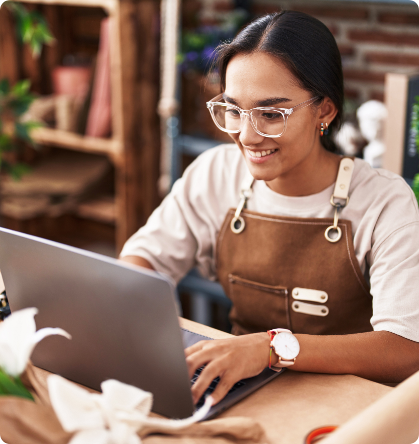 Woman working at a computer.