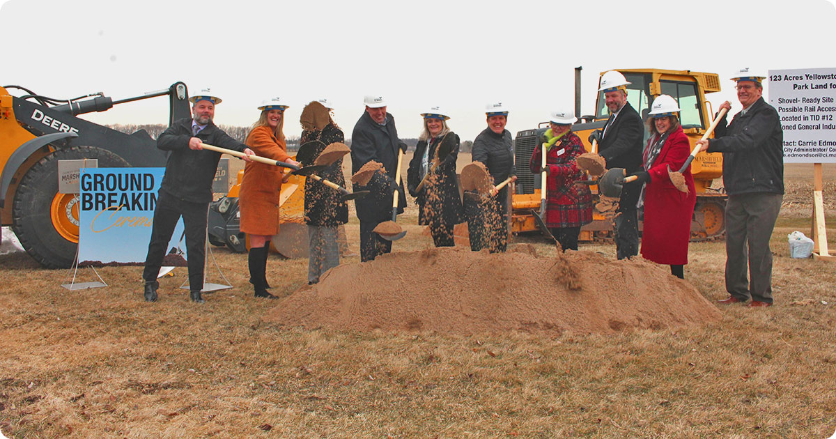 Image of people with shovels at ground breaking ceremony.