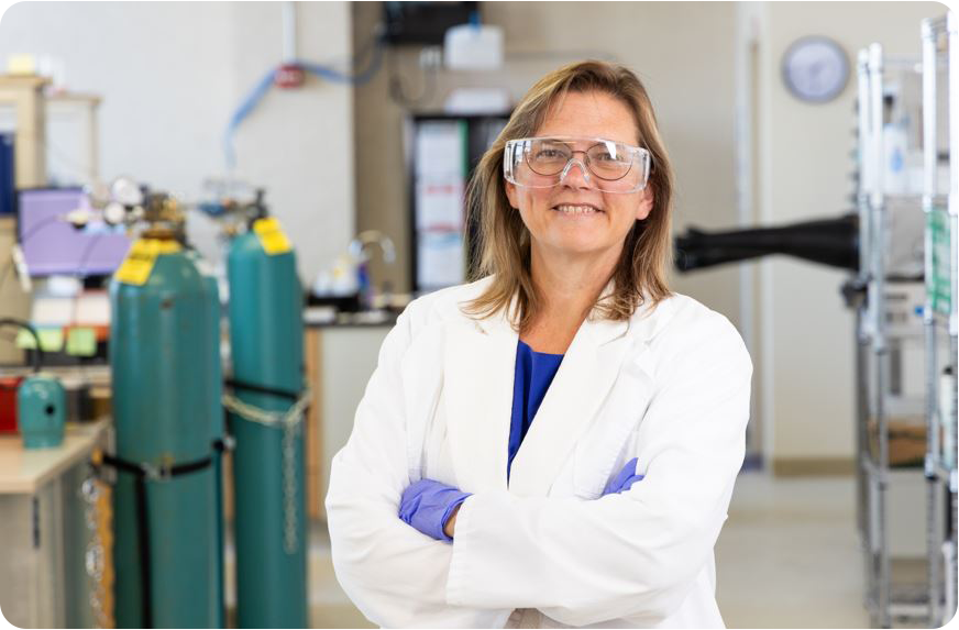 Image of Dr. Carol Hirschmugl in her lab at COnovate.