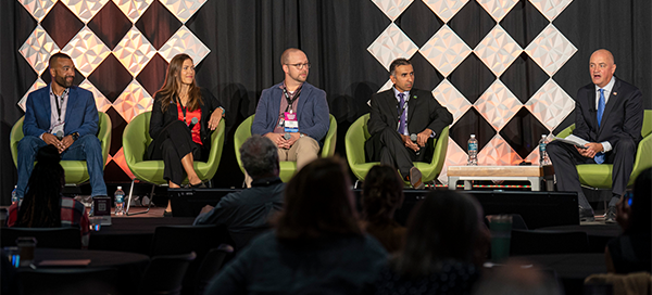 Photo of Economic Summit 2024 panel, featuring (from L to R) Craig Andersen, Jane Stull, Kyle Crum, Ajay Sahajpal, and moderator Matt Kirchner.