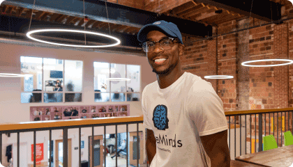 Image of a man in casual clothes smiling at the camera