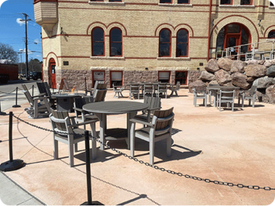 Danes Hall Plaza with Furniture-2 Outdoor tables and chairs on a plaza.
