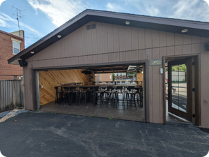 Renovated storage garage converted into a versatile three-season event space.