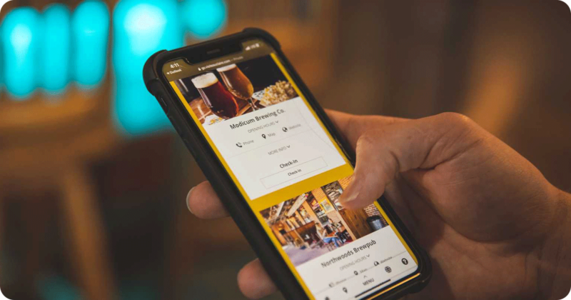 Person scrolling on their smartphone.