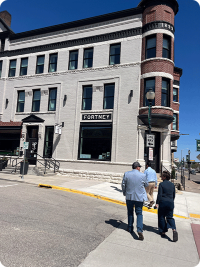 People entering the Hotel Fortney in Viroqua.