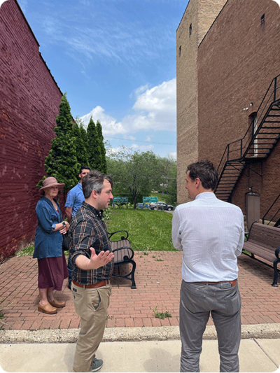 Sam Rikkers visits a vacant lot in downtown Dodgeville that will be converted into public space.
