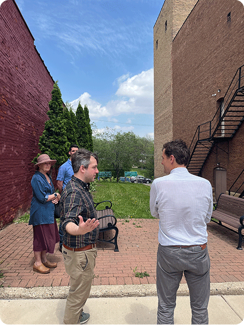 Sam Rikkers visits a vacant lot in downtown Dodgeville that will be converted into public space.