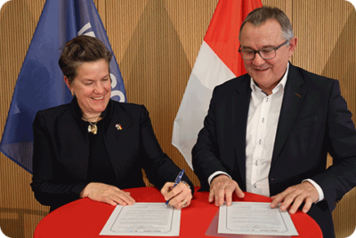 Secretary Hughes and the Hessen Trade and Invest GmbH CEO signed a memorandum of understanding