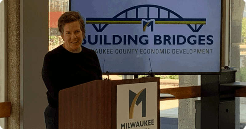 Sec. Missy Hughes speaks at the announcement of the Building Bridges small business development and commercial corridor program.