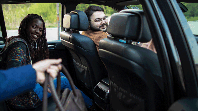 Three people carpooling to work.