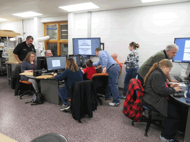 Community members using the Antigo High School fab lab.