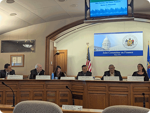 Sam Rikkers moderates a panel of Wisconsin experts and leaders from a cross-section of the forest products industry.