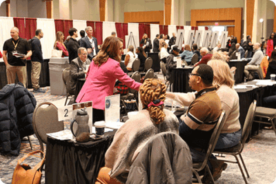 Buyers meeting with business woman shaking hands with agency representatives.