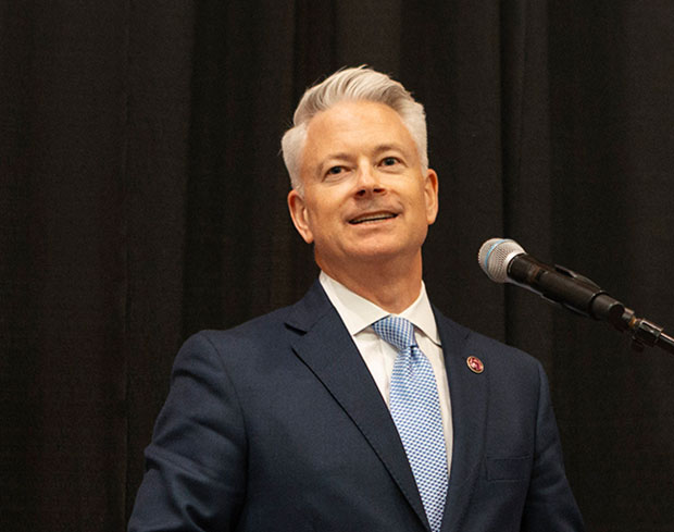 Collage of WEDC executives.