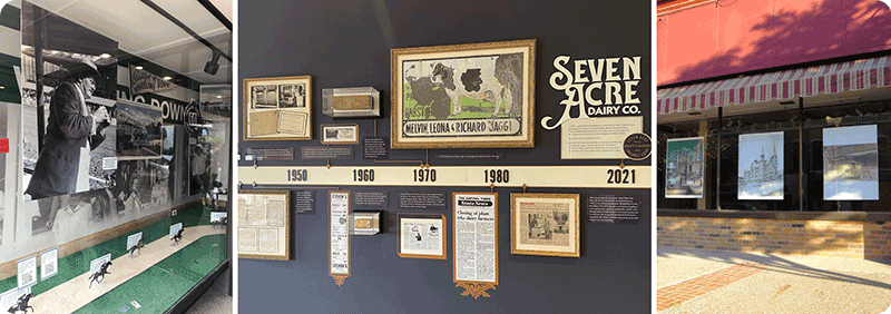 A timeline of local history displayed in a storefront window.