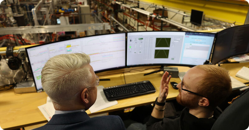 Secretary/CEO John W. Miller receives a demonstration at Realta Fusion