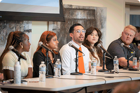 A panel of young workers tell their stories at the Wisconsin Economic Summit.