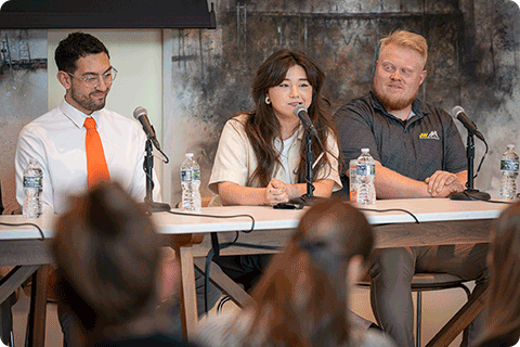 McKenna Scherer answers questions during a panel discussion of young professionals.