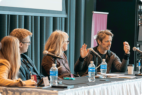 Zach Halmstad answers a question during the panel Regional Dreamers: Building the Communities of Tomorrow.
