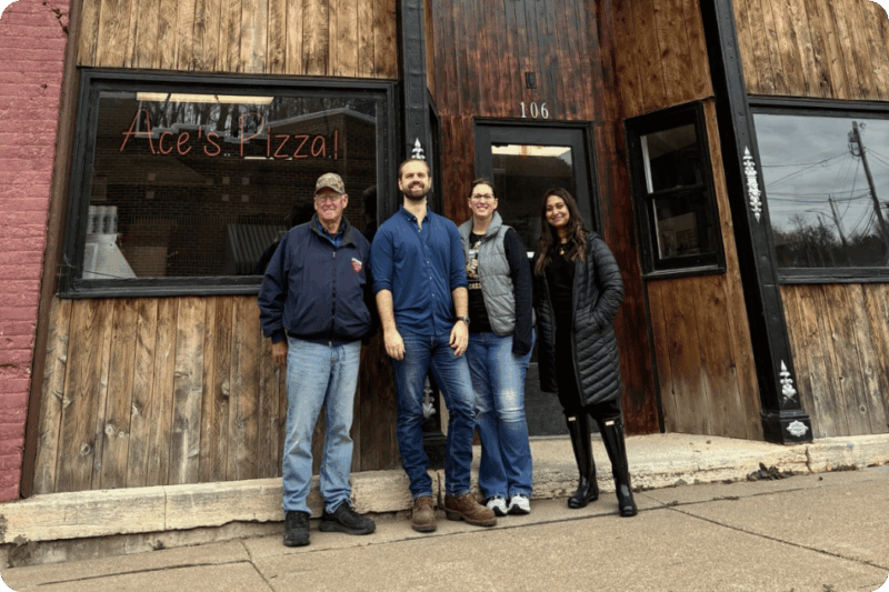 In front of the building at 106 N Main St, Potosi